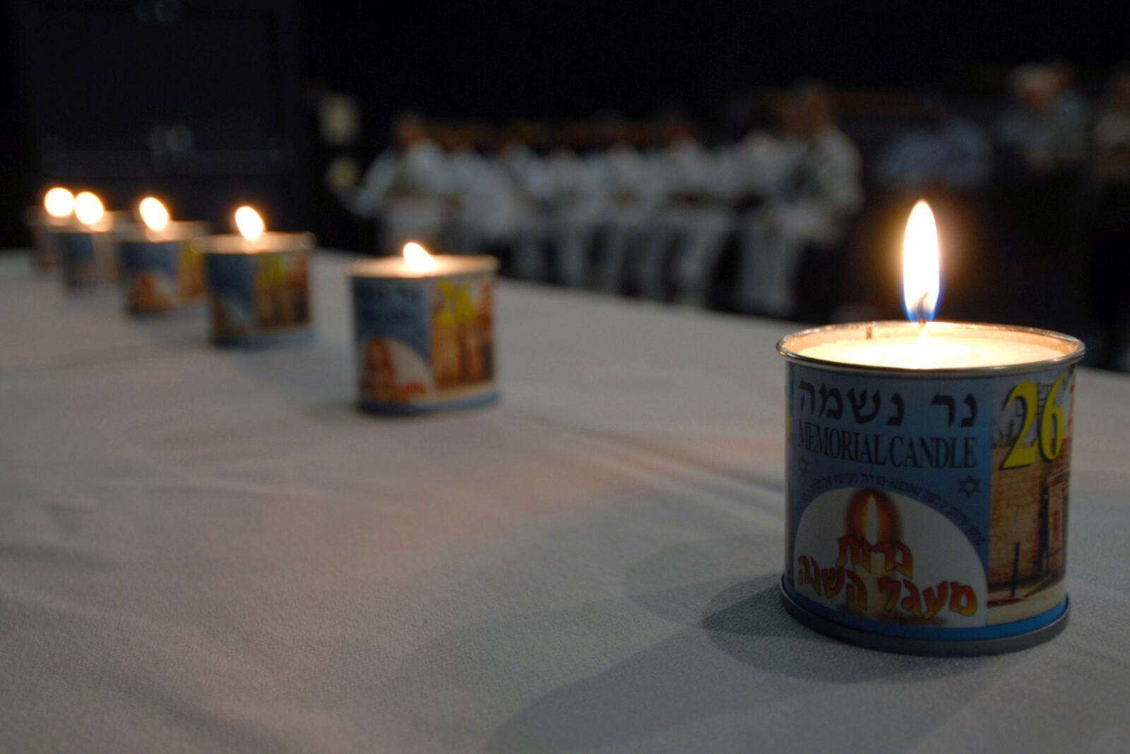 PEARL HARBOR, Hawaii (April 26, 2007) - Six memorial candles are lit during a Holocaust Remembrance Day ceremony at Sharkey Theater on board Naval Station Pearl Harbor. The six candles were lit during the opening remarks of the remembrance observation to commemorate the lives of more than 6 million Jews that were lost during the Holocaust. U.S. Navy photo by Mass Communication Specialist 1st Class James E. Foehl (RELEASED)